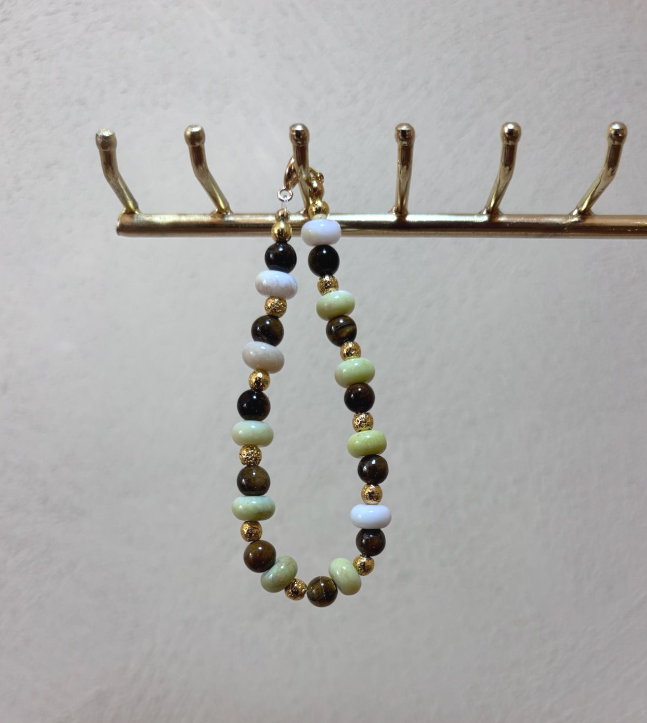 Handgemaakte armband met tijgeroog, hematiet en glazen rondellen