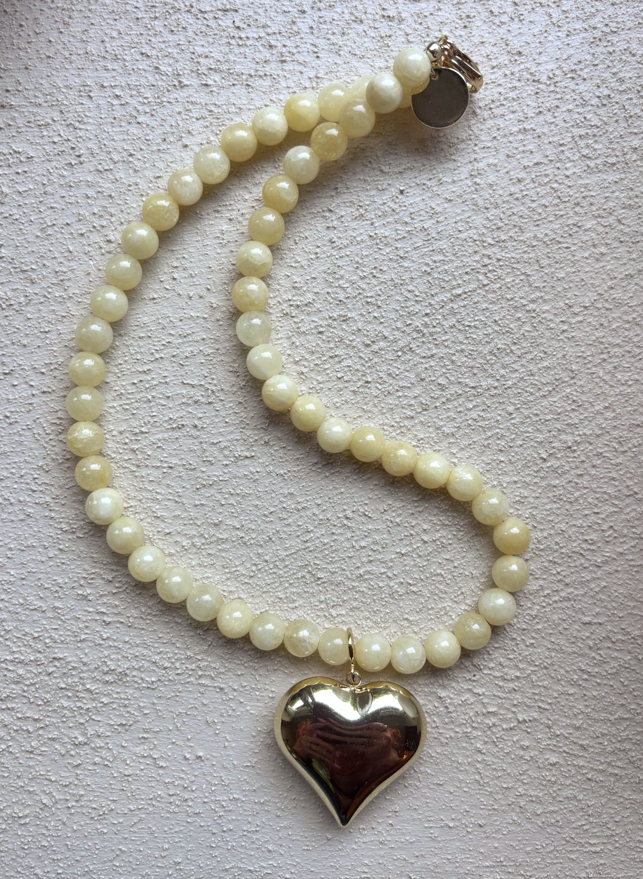 Ketting butter yellow jade met gouden hart