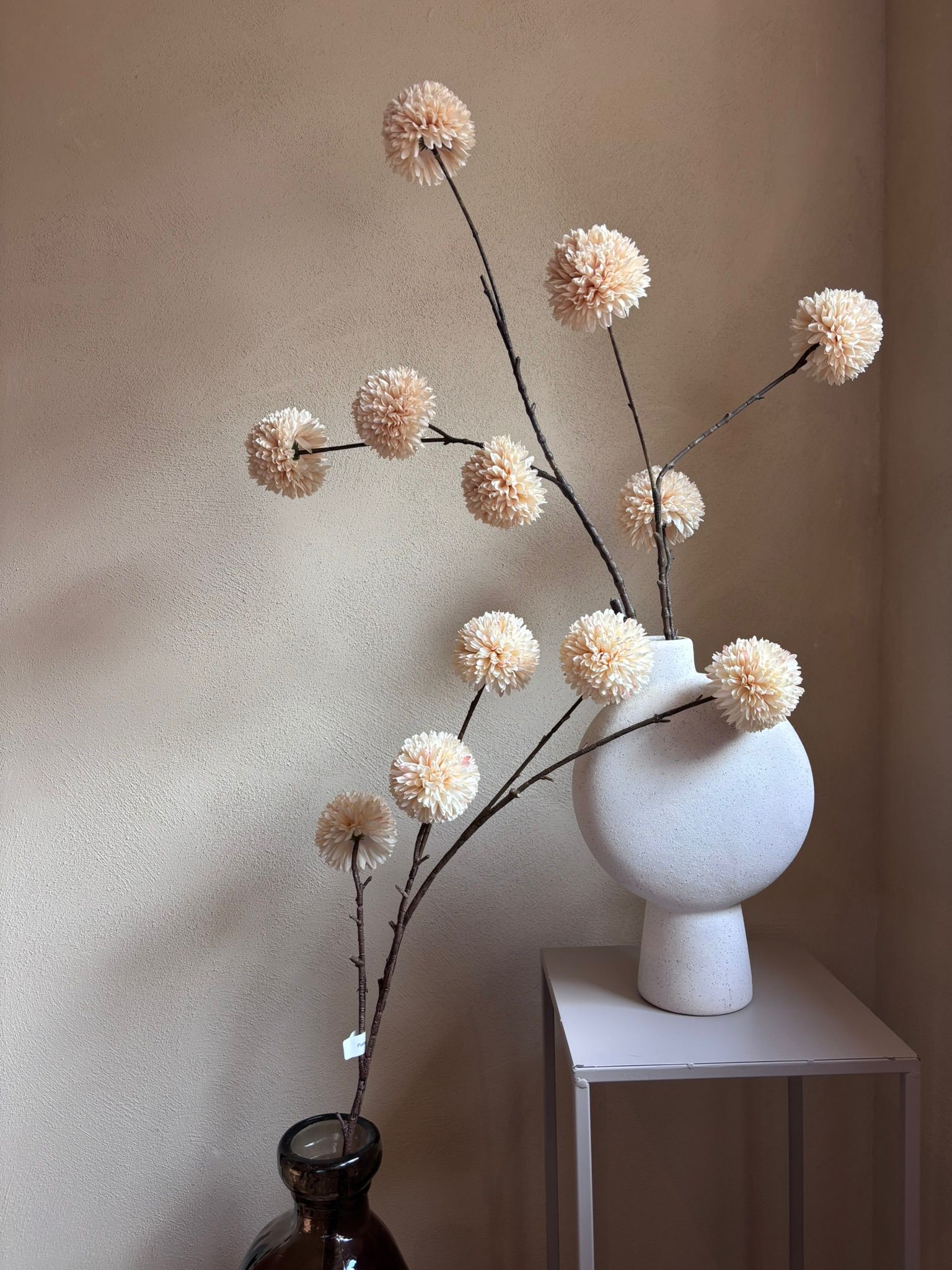 Pompom aan tak beige