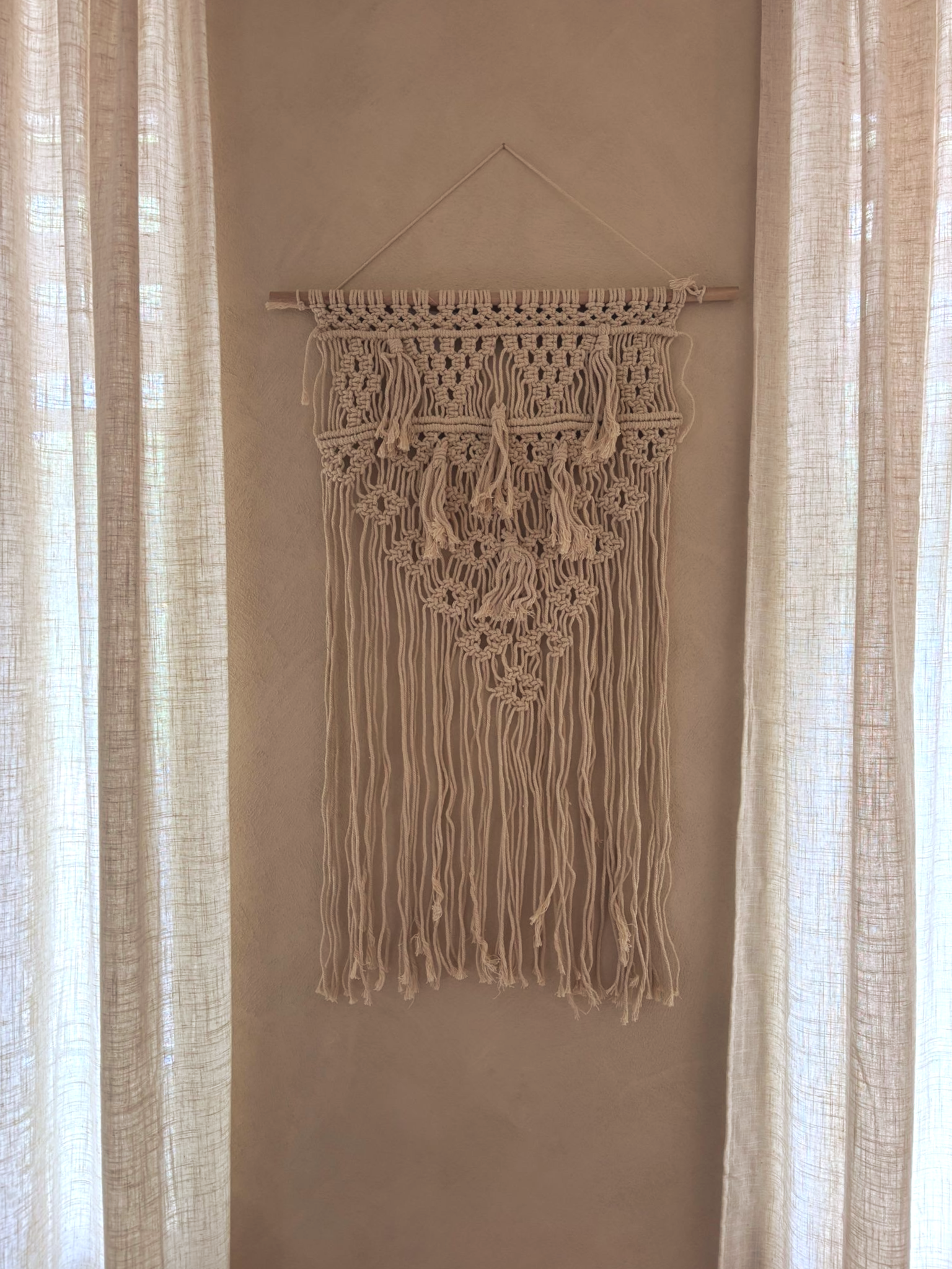 Uitverkocht - Macramé wanddecoratie