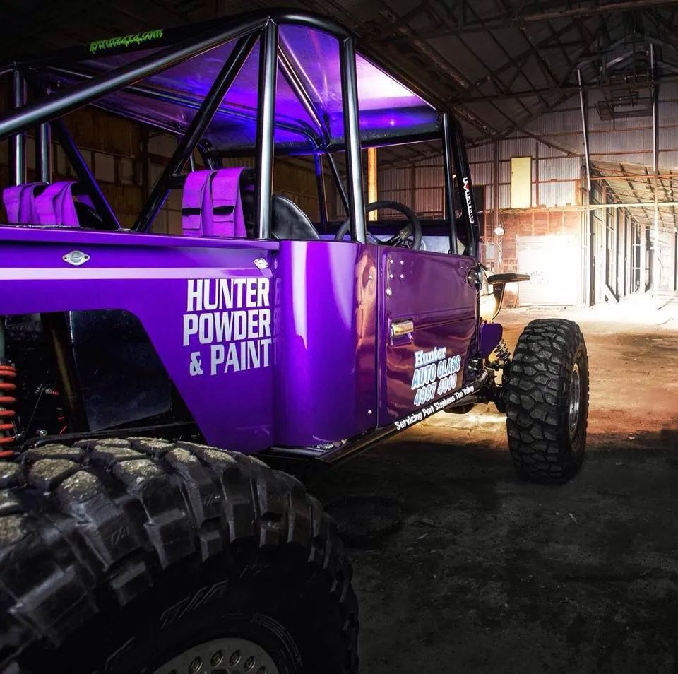 A Purple Vehicle Has A Sticker On The Side That Says Hunter Powder & Paint — Hunter Powder & Paints In Rutherford, NSW