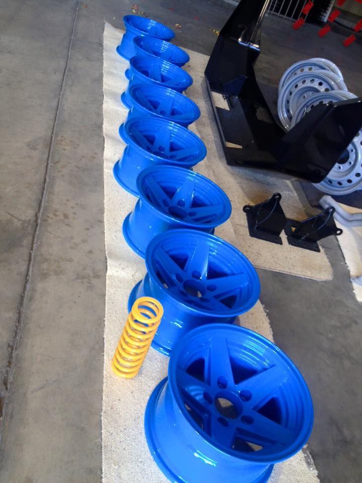 A Row Of Blue Wheels And A Yellow Spring — Hunter Powder & Paints In Muswellbrook, NSW