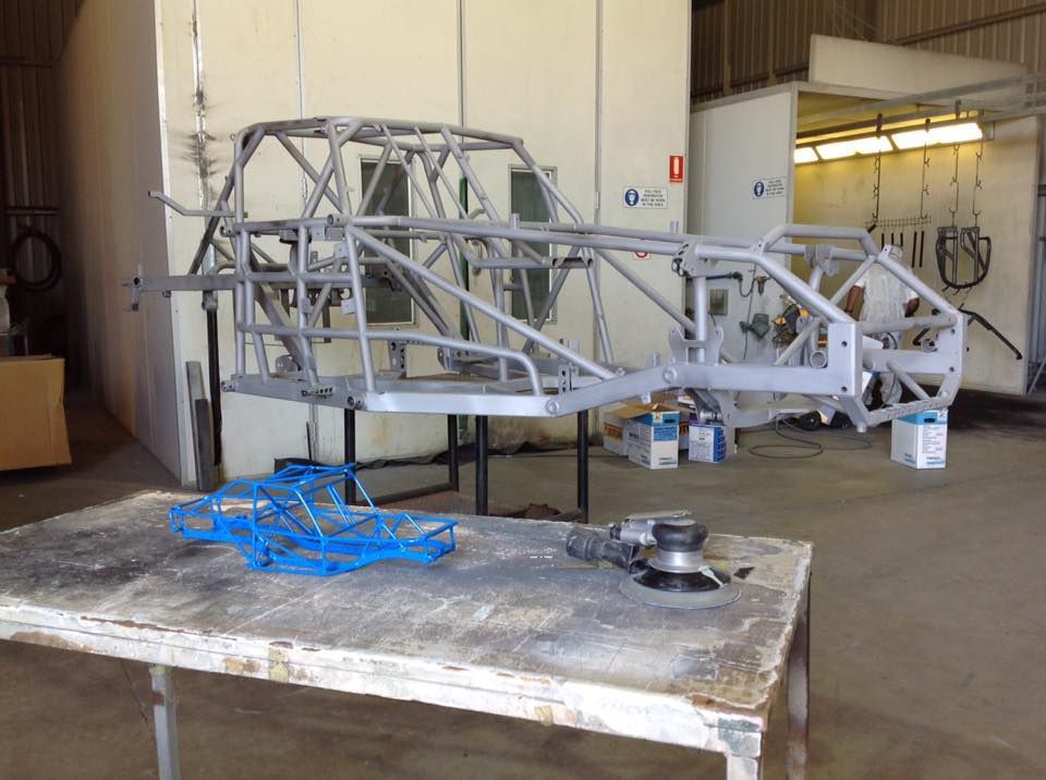 A Metal Frame Is Sitting On A Table In A Garage — Hunter Powder & Paints In Scone, NSW