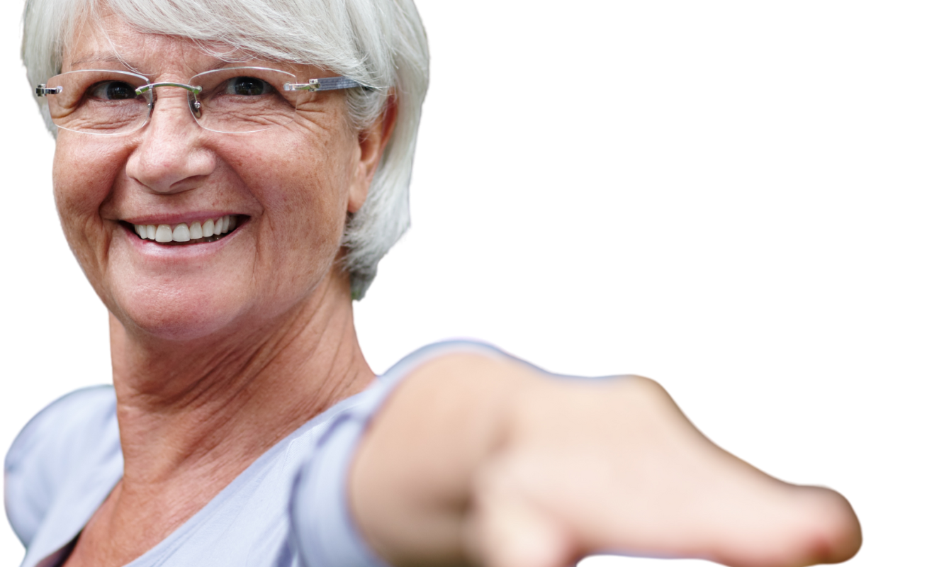 Smiling person wearing glasses performing a yoga pose with one arm extended forward.