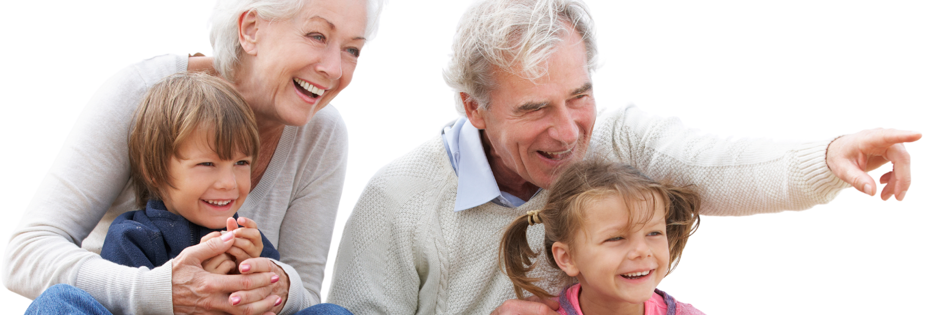 Two people are smiling as one points into the distance, with two young children looking in the same direction.
