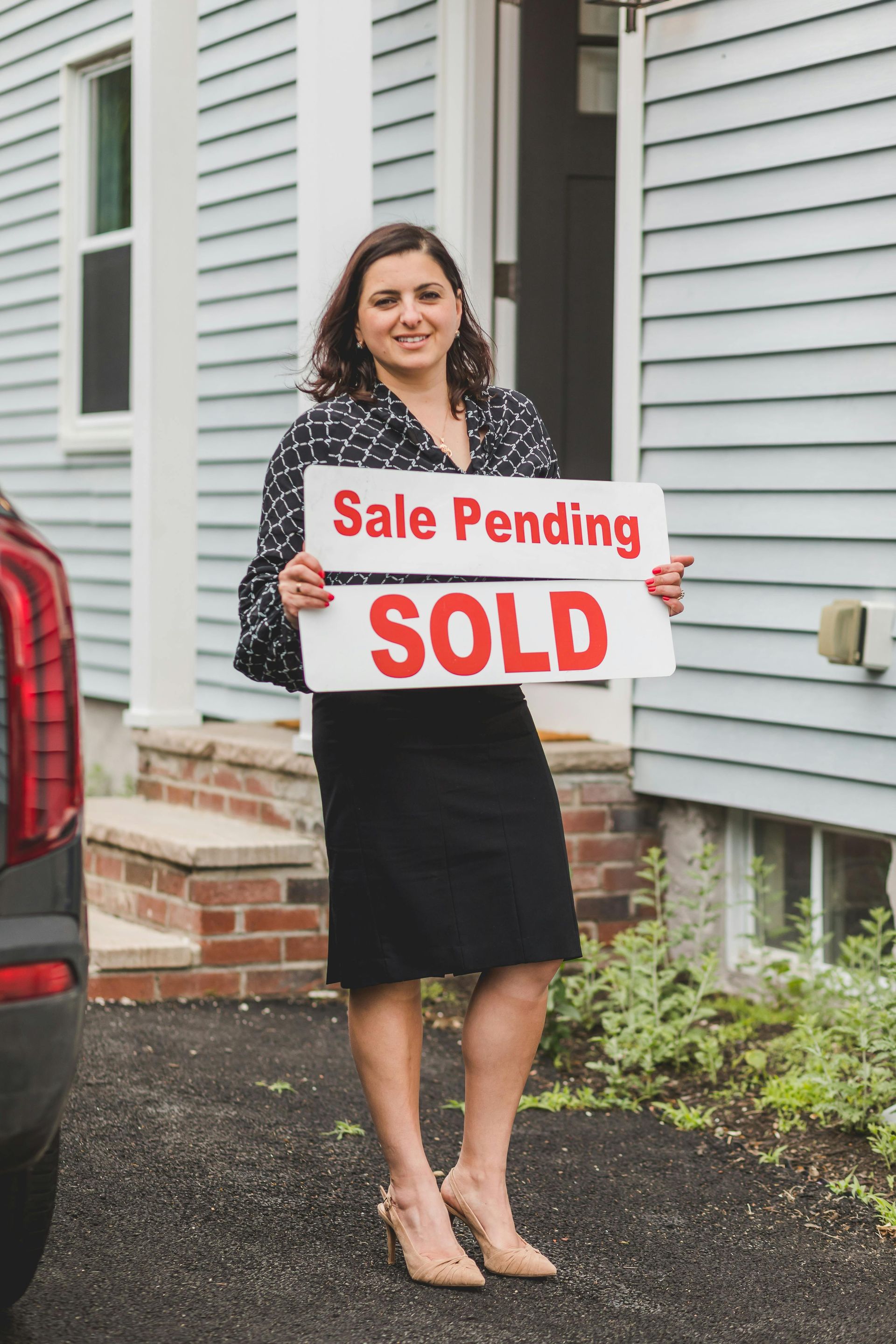 Real estate agent holding
