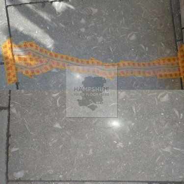 Close-up of limestone surface after honing to remove scratches and etching