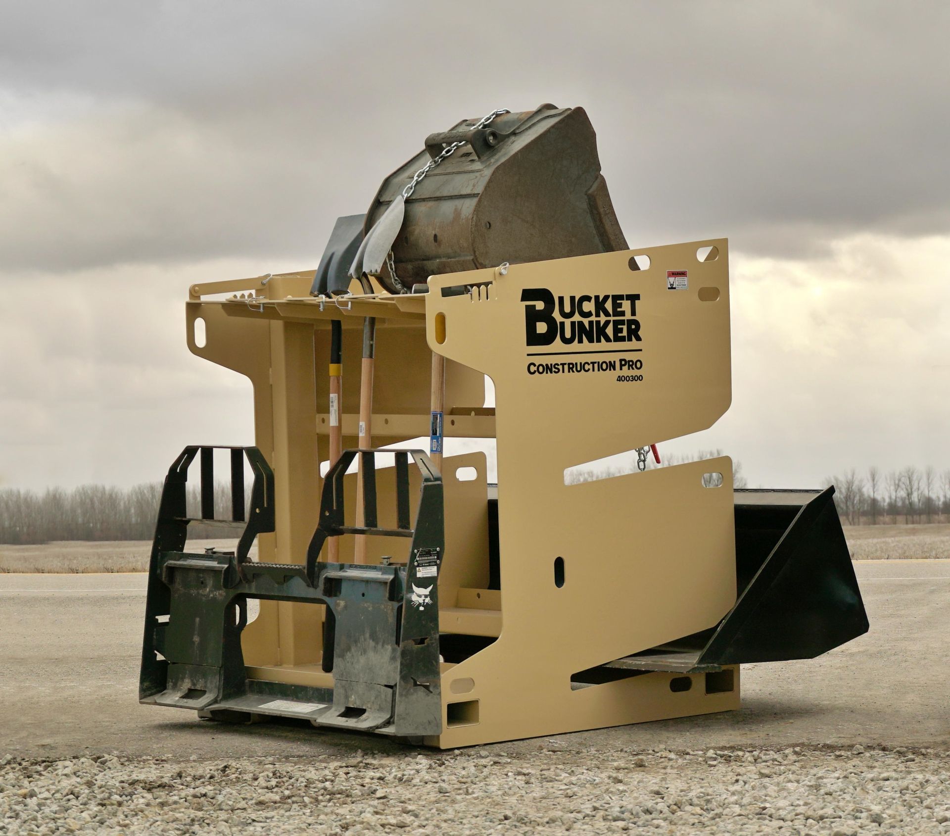 A bucket bunker with a large bucket on top of it