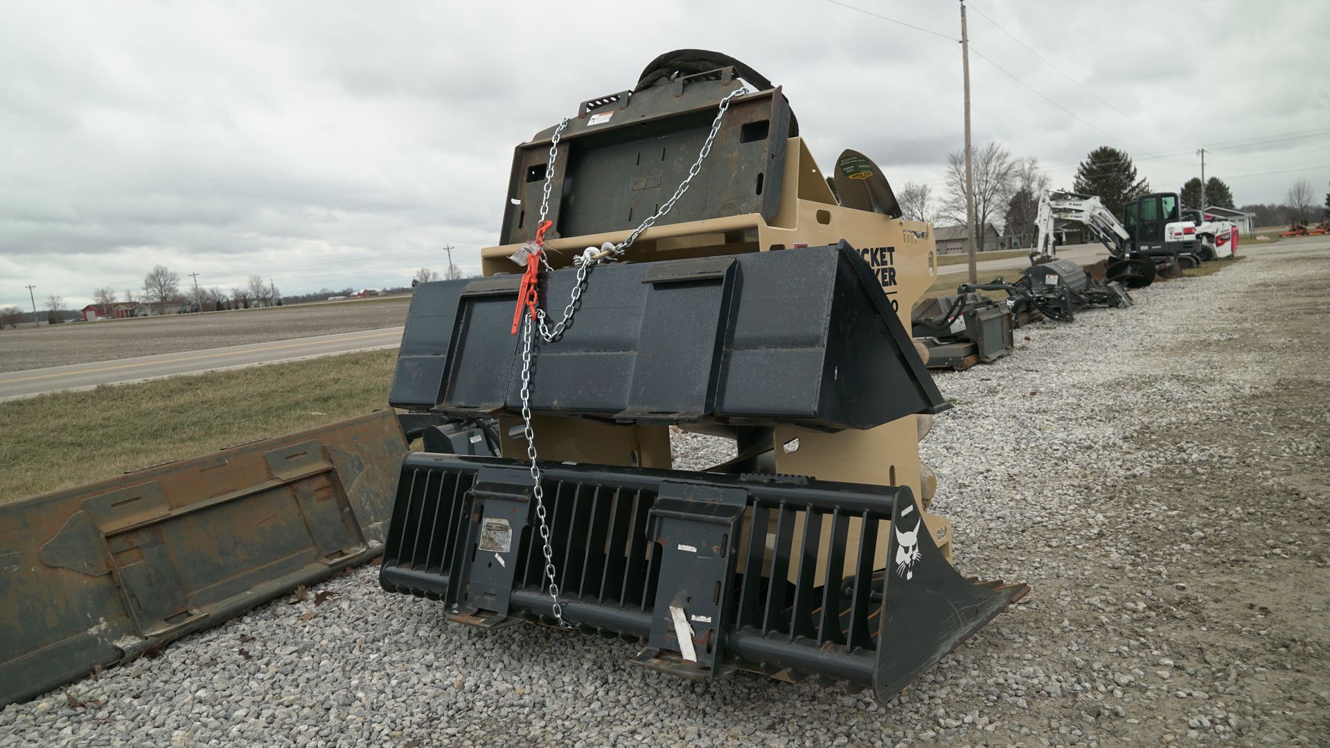 A bulldozer with a bucket attached to it