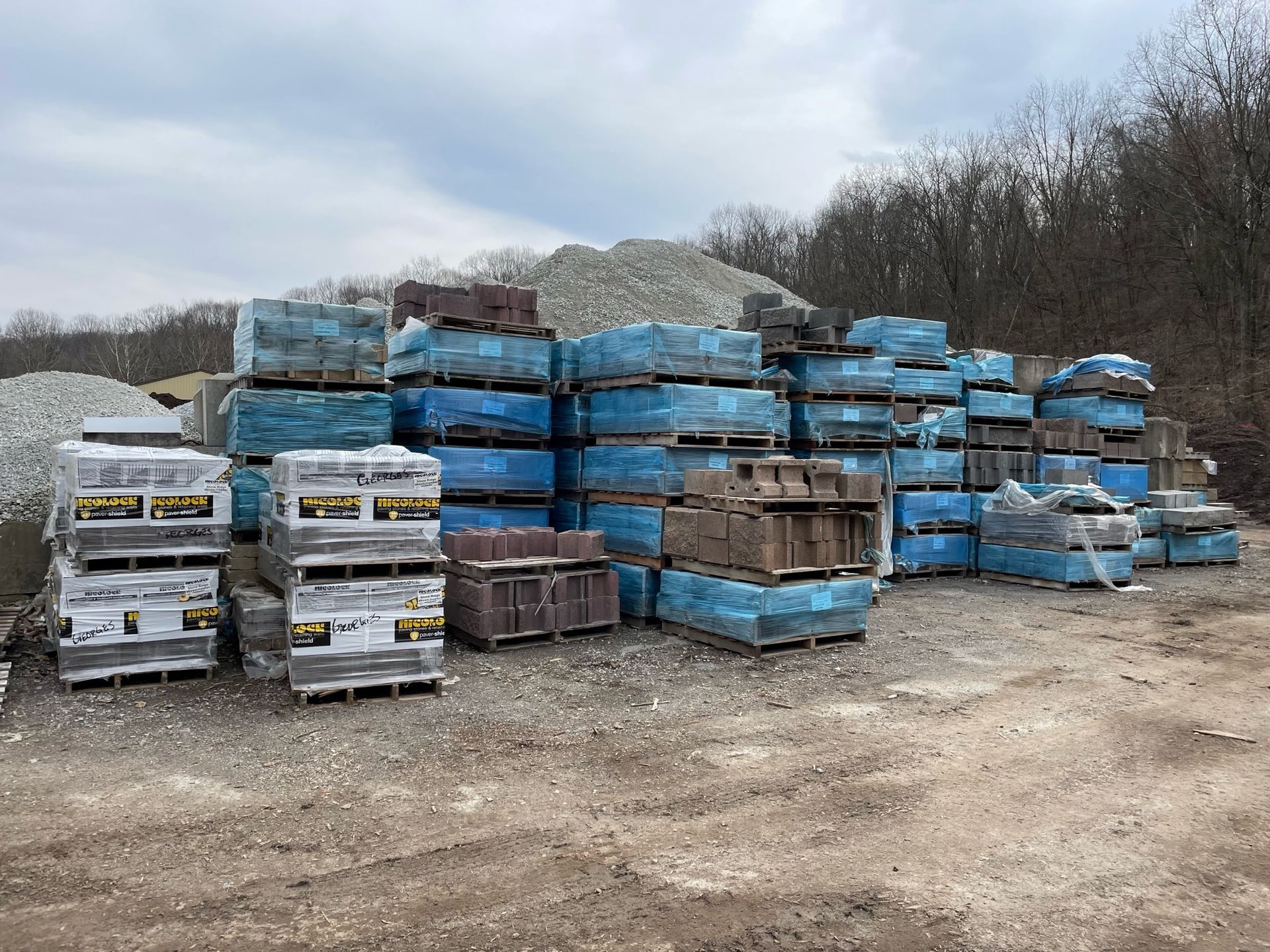 Contractor Laying Concrete Tiles — South Park, PA — Georges Supply Center Contractor Laying Concrete Tiles — South Park, PA — Georges Supply Center