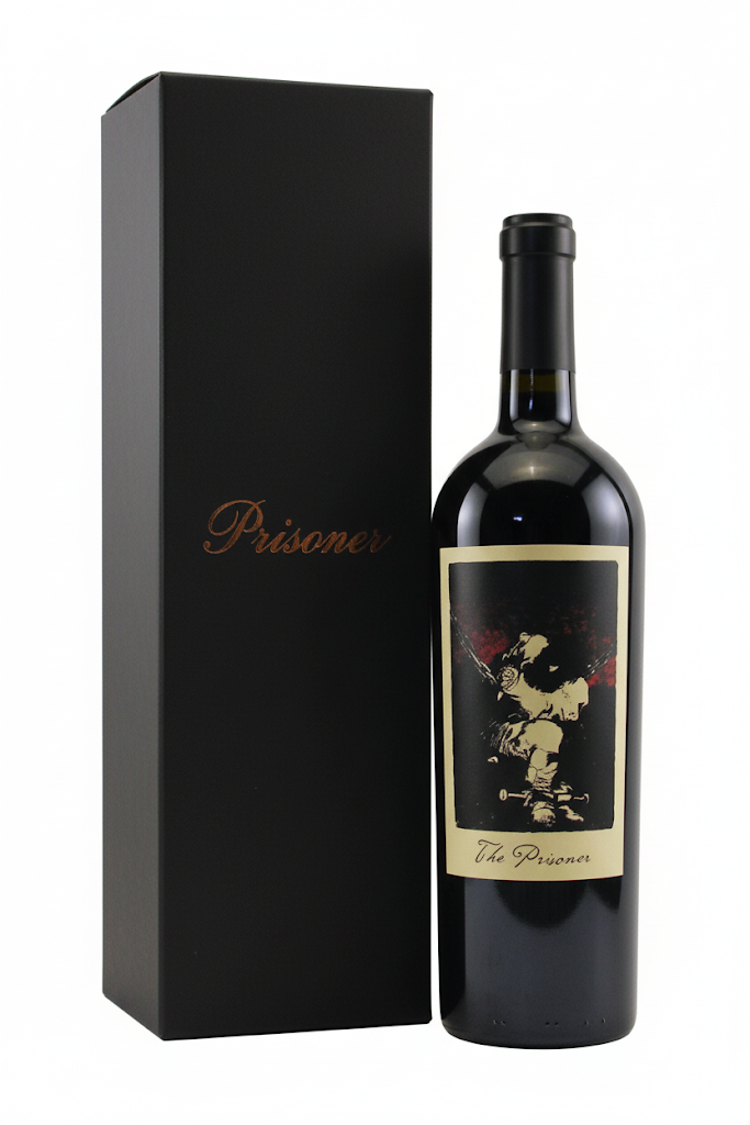 Wine bottle and black box on white background; bottle of red wine with a dark label, next to a black gift box.