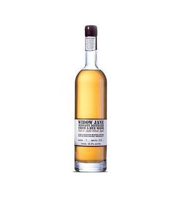 Bottle of whiskey with white label.