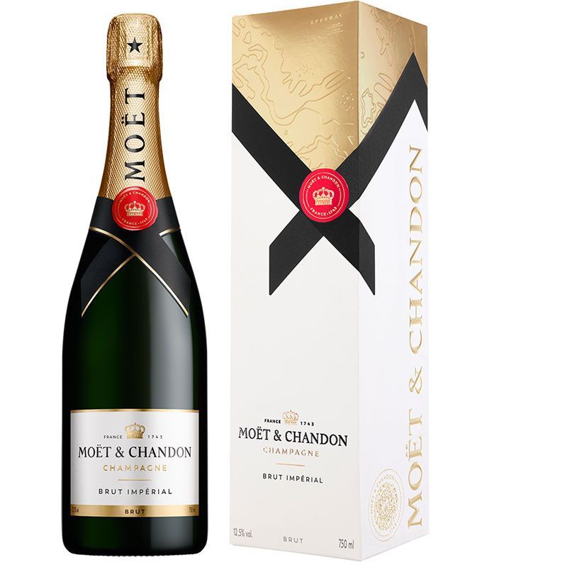 Moët & Chandon champagne bottle with gift box; green glass, gold label, white box with black ribbon.