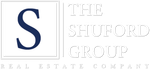 Logo for The Shuford Group Real Estate Company with a large blue “S” and white text