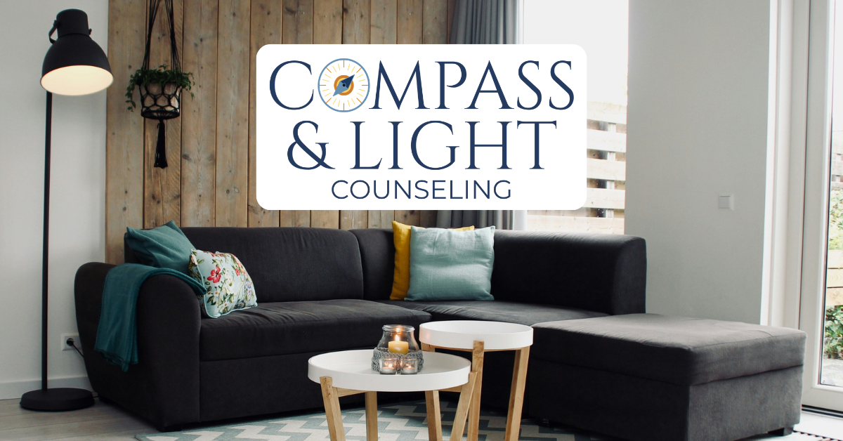 Comfy Couch with Compass and Light Counseling Logo Displayed Above It