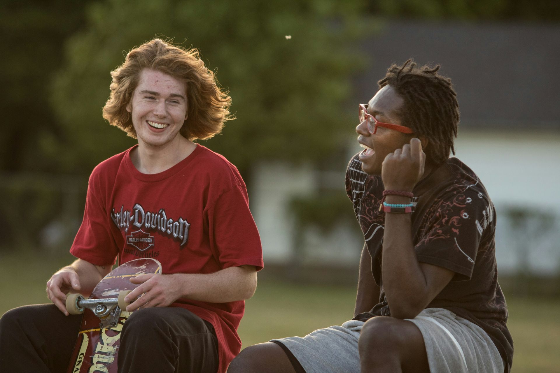 Photo of two teenage boys laughing 