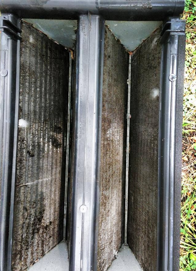 A close up of a metal structure with a few holes in it