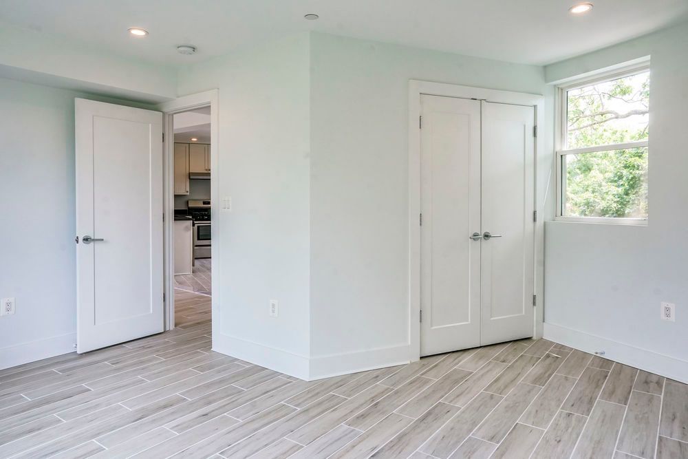 There is a window in the corner of the room.