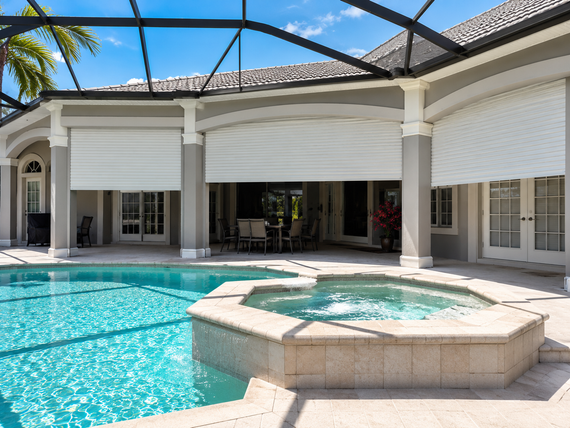 Impact Garage Doors — House with Garage Door in Fort Myers, FL