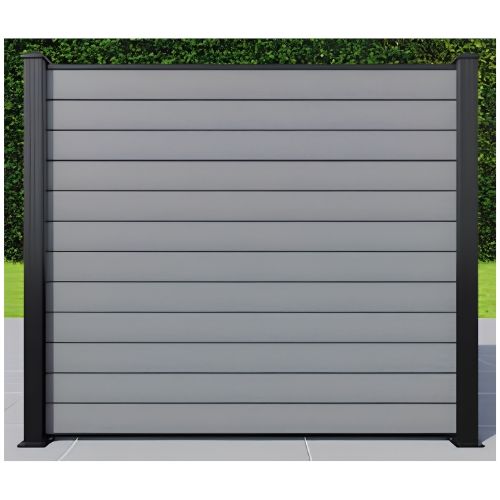 Gray slatted metal fence panel with dark posts, set against green hedges and pavement
