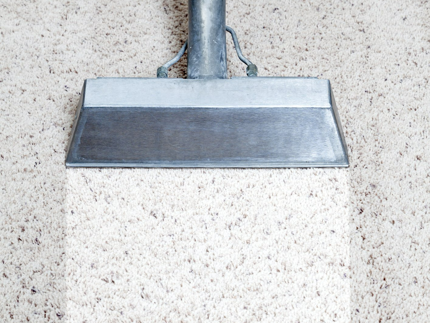 Vacuuming Carpet — South Bend, IN — MasterCare Inc. Residential carpet cleaning services in progress in Mishawaka, IN, or a surrounding area