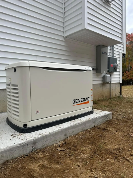Hand inserting a white outlet cover into an electrical outlet. Beige wall. A Generac generator outside a white house, on a concrete pad. Orange text on the generator. Electrical box visible.