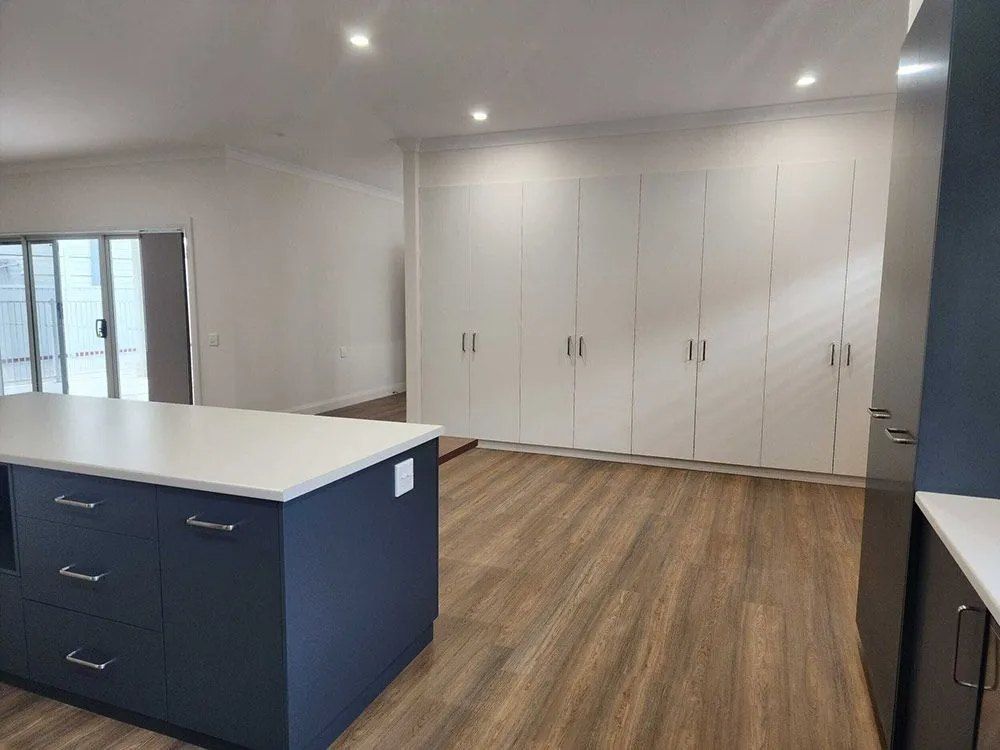 There is a Large Island in the Middle of the Kitchen — Chandolin Construction in Bathurst, NSW