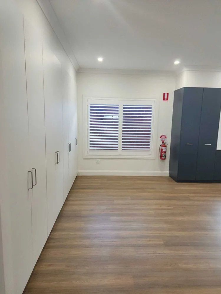 There is a Fire Extinguisher in the Corner of the Room — Chandolin Construction in Bathurst, NSW
