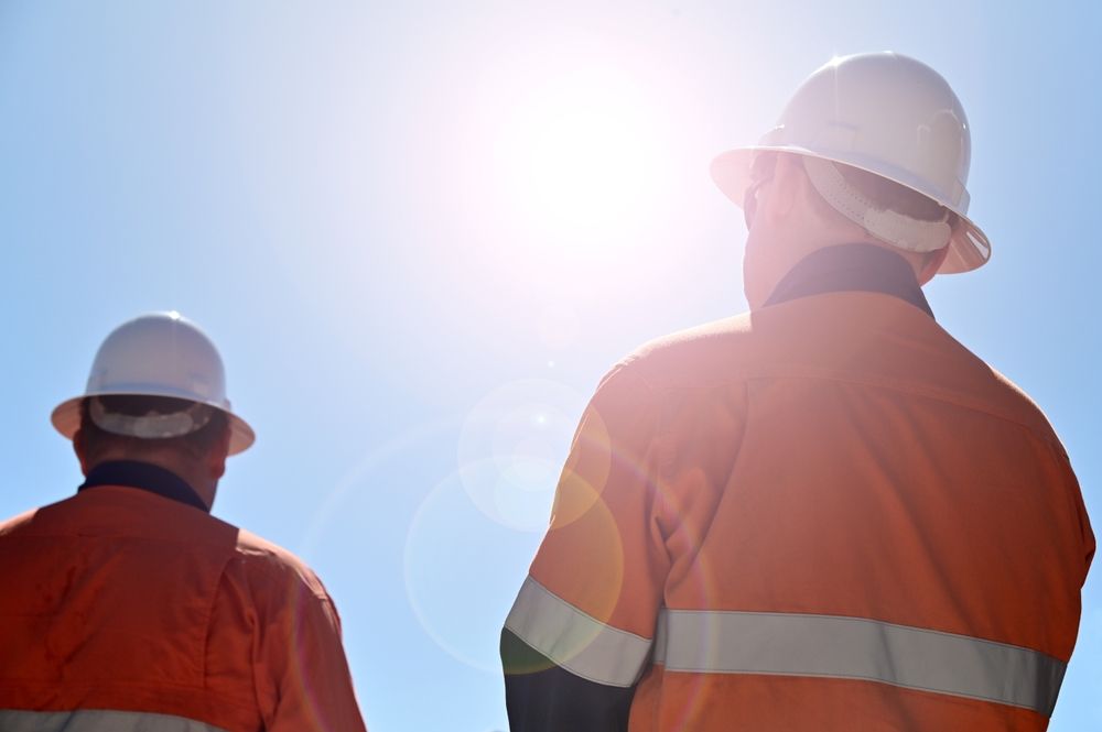 A Construction Workers Are Working On A Building Under Construction — Burton Group In Ciccone, NT