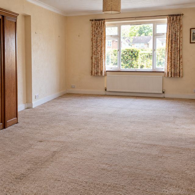 The same room empty and swept after the clearance