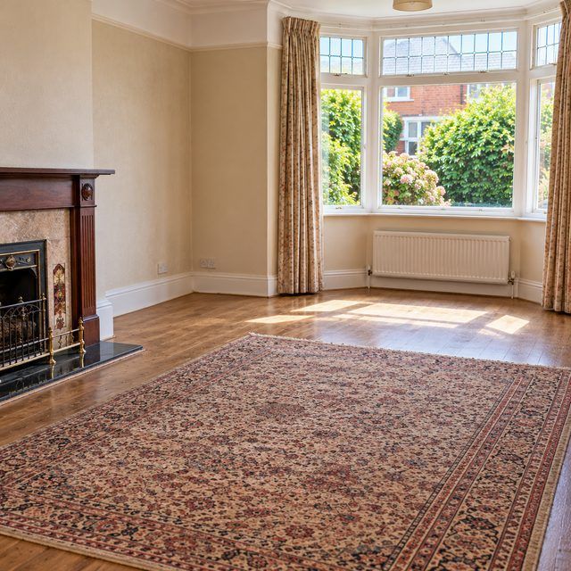The same room empty and swept after the clearance