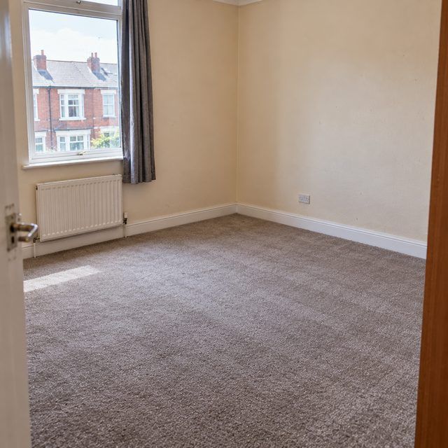 The same room empty and swept after the clearance