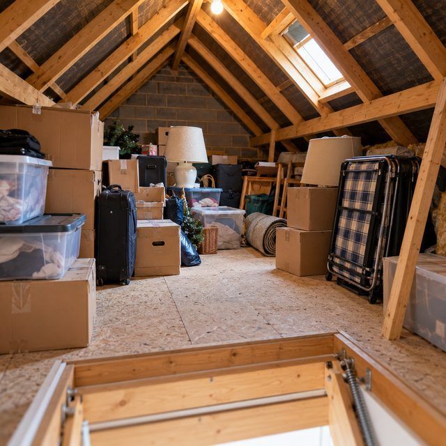 Room full of furniture and belongings before the clearance