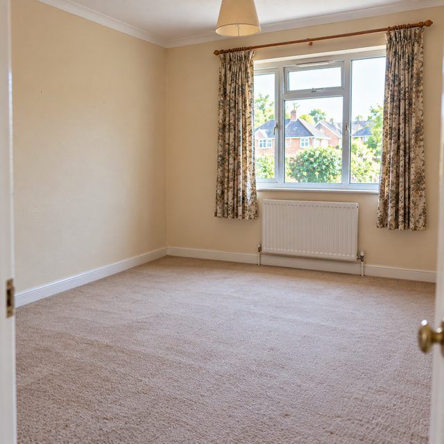 The same room empty and swept after the clearance