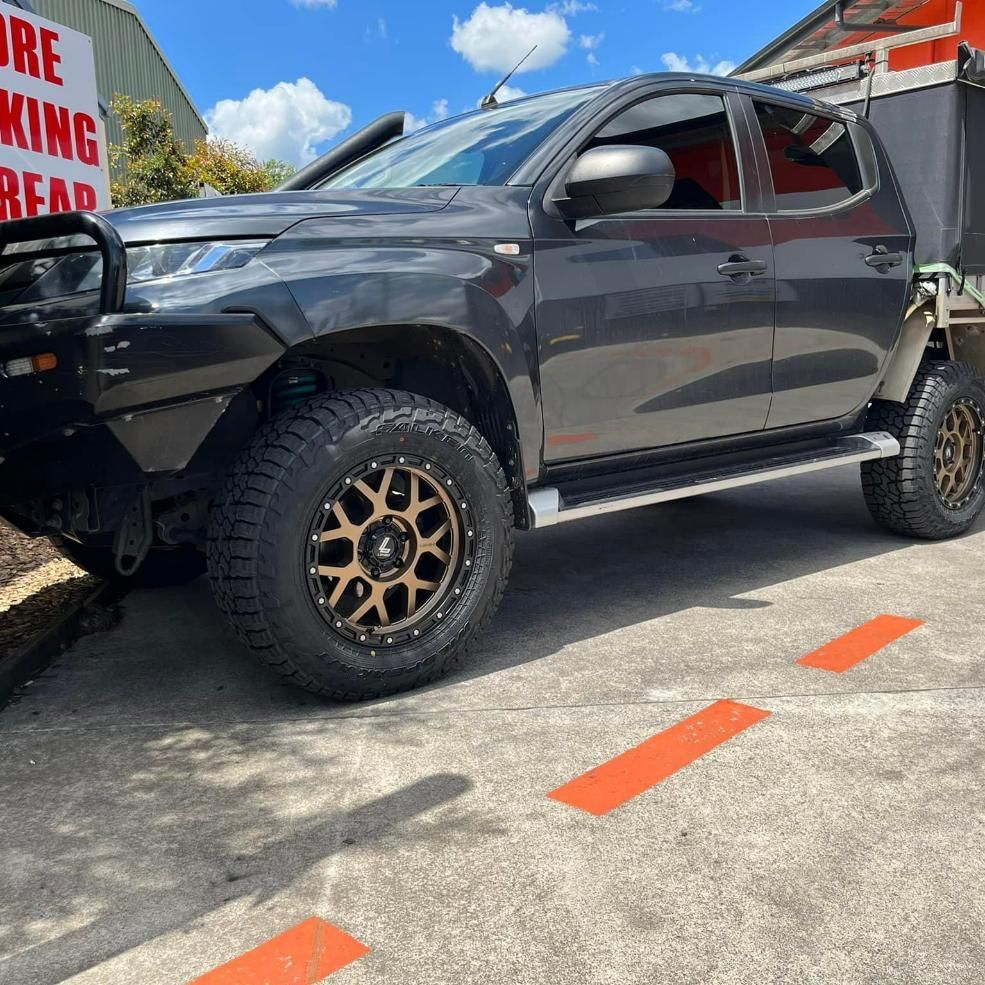 Black Truck Parked on a Road