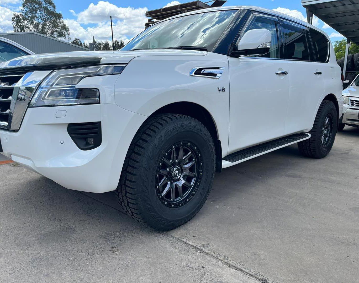 White Car With Replaced Tyres