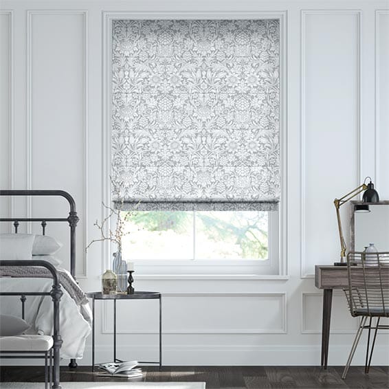 White room with modern roller blinds