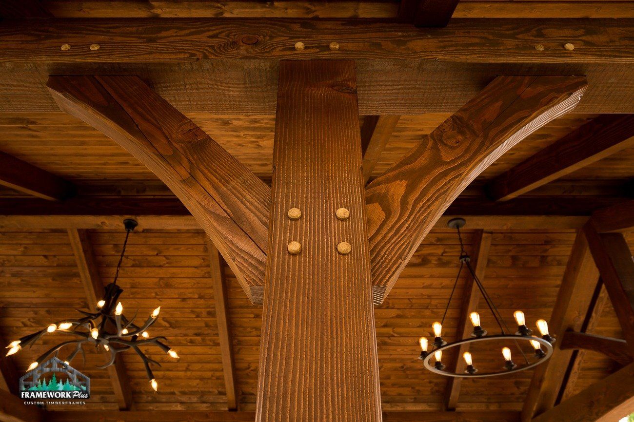A wooden structure with a chandelier hanging from the ceiling.