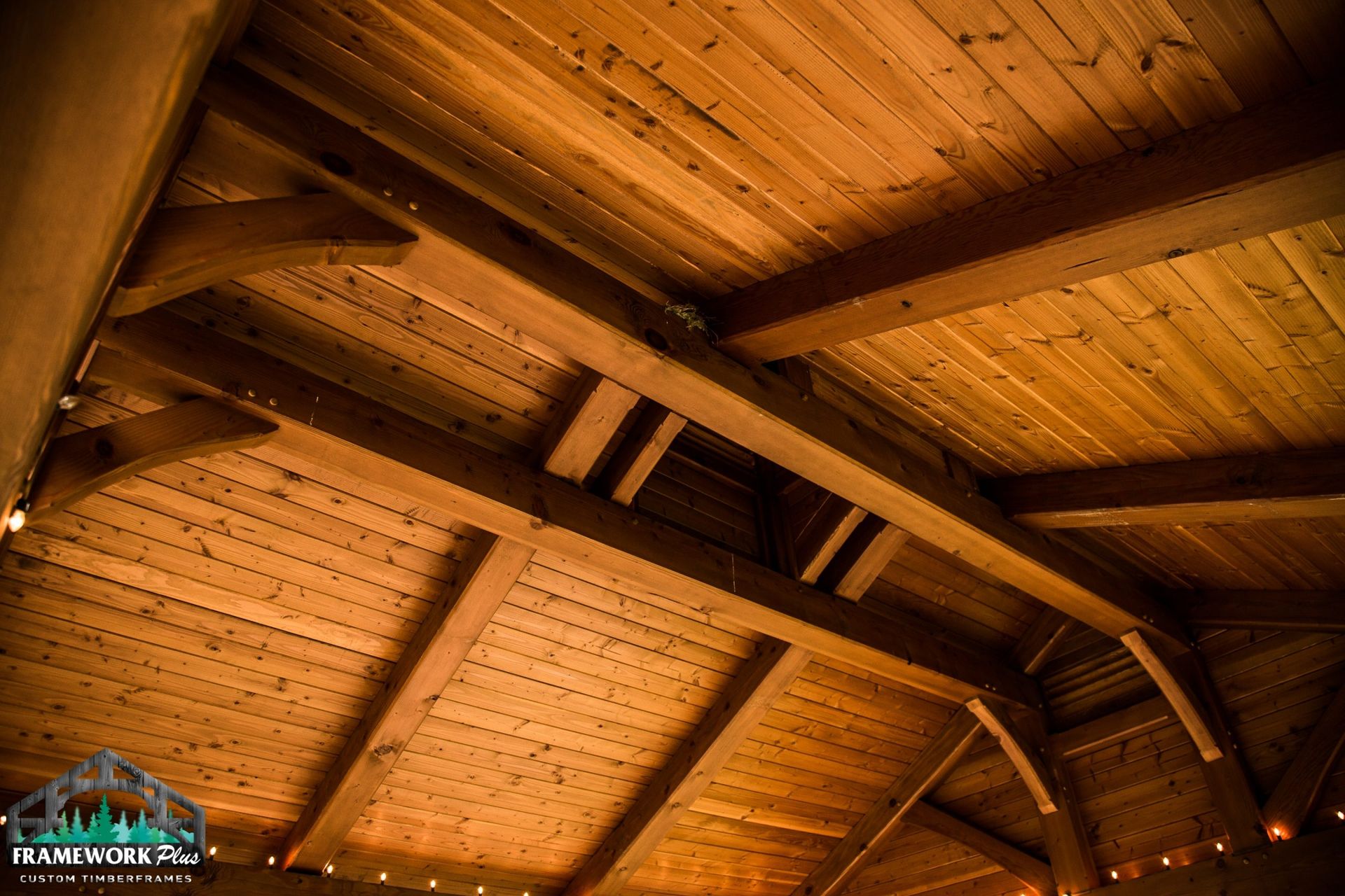 Looking up at the ceiling of a wooden building