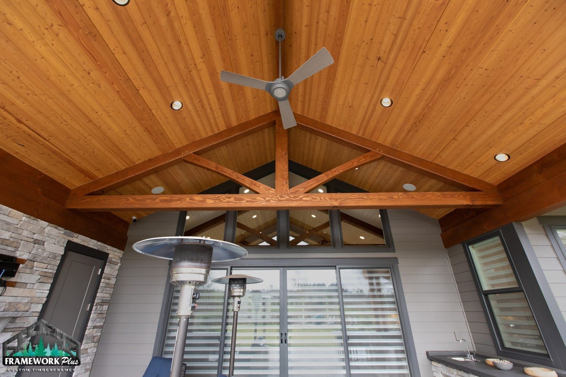 A ceiling fan is hanging from the ceiling of a house.