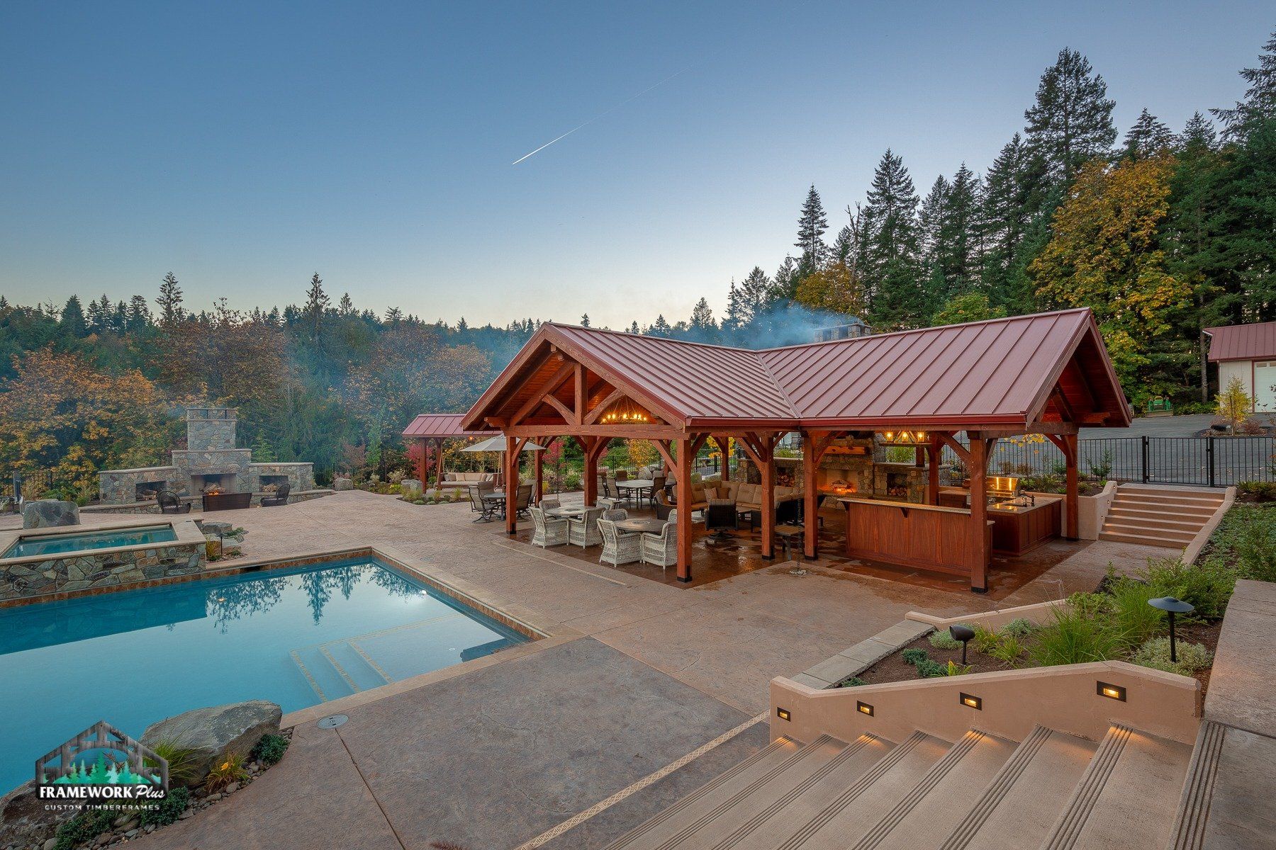 A large house with a swimming pool and stairs leading to it