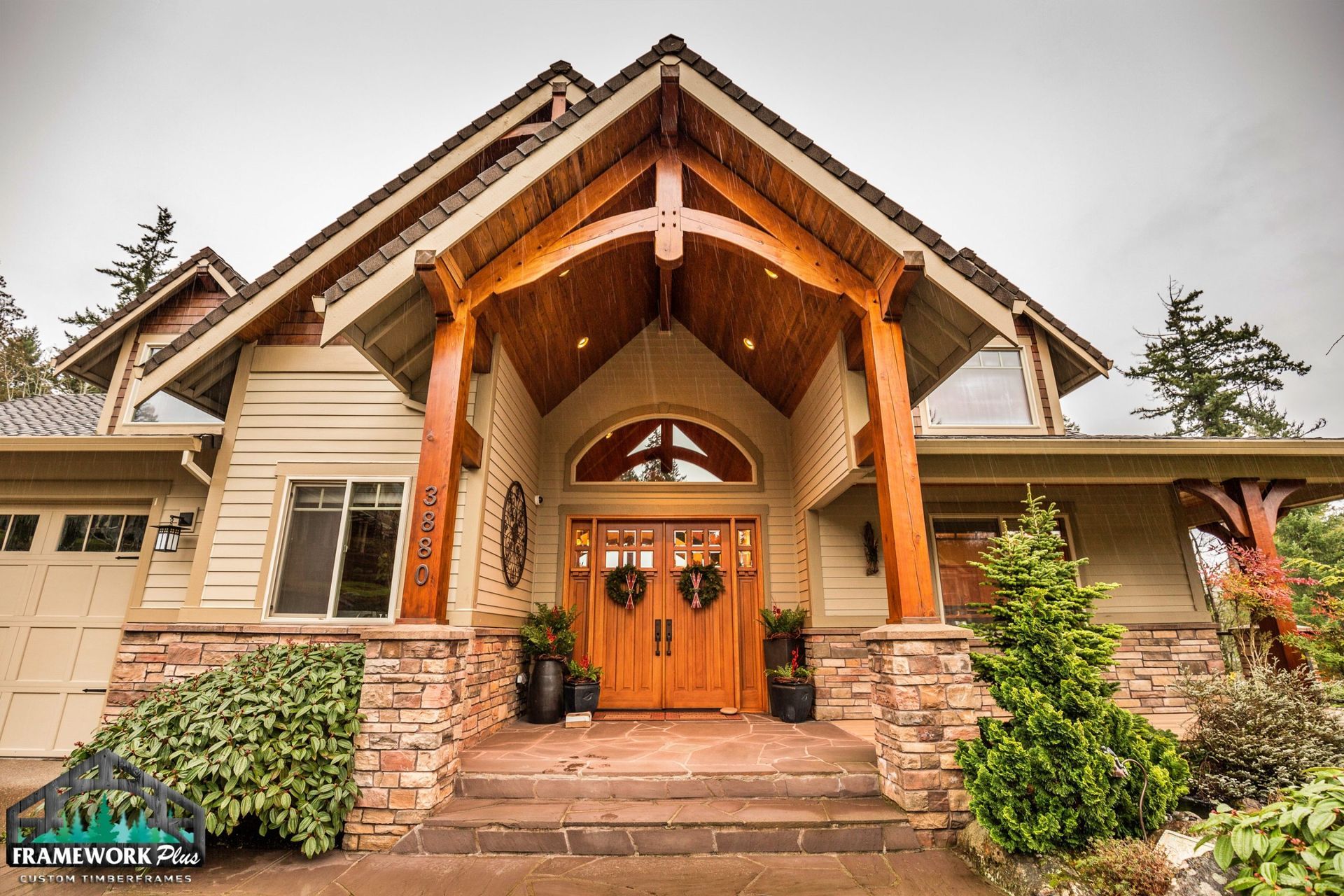 A large house with a large porch and a wooden roof