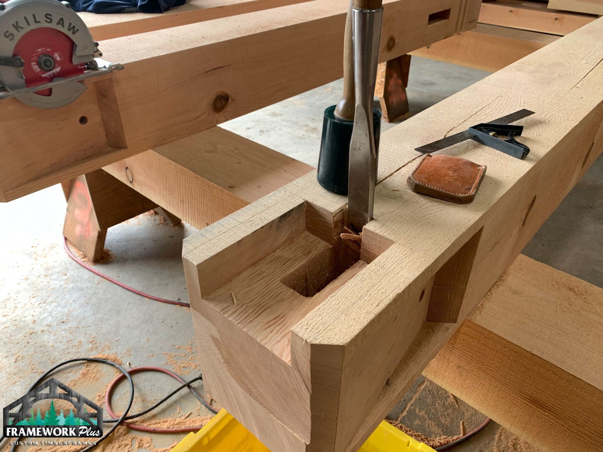 A circular saw is being used to cut a hole in a piece of wood.