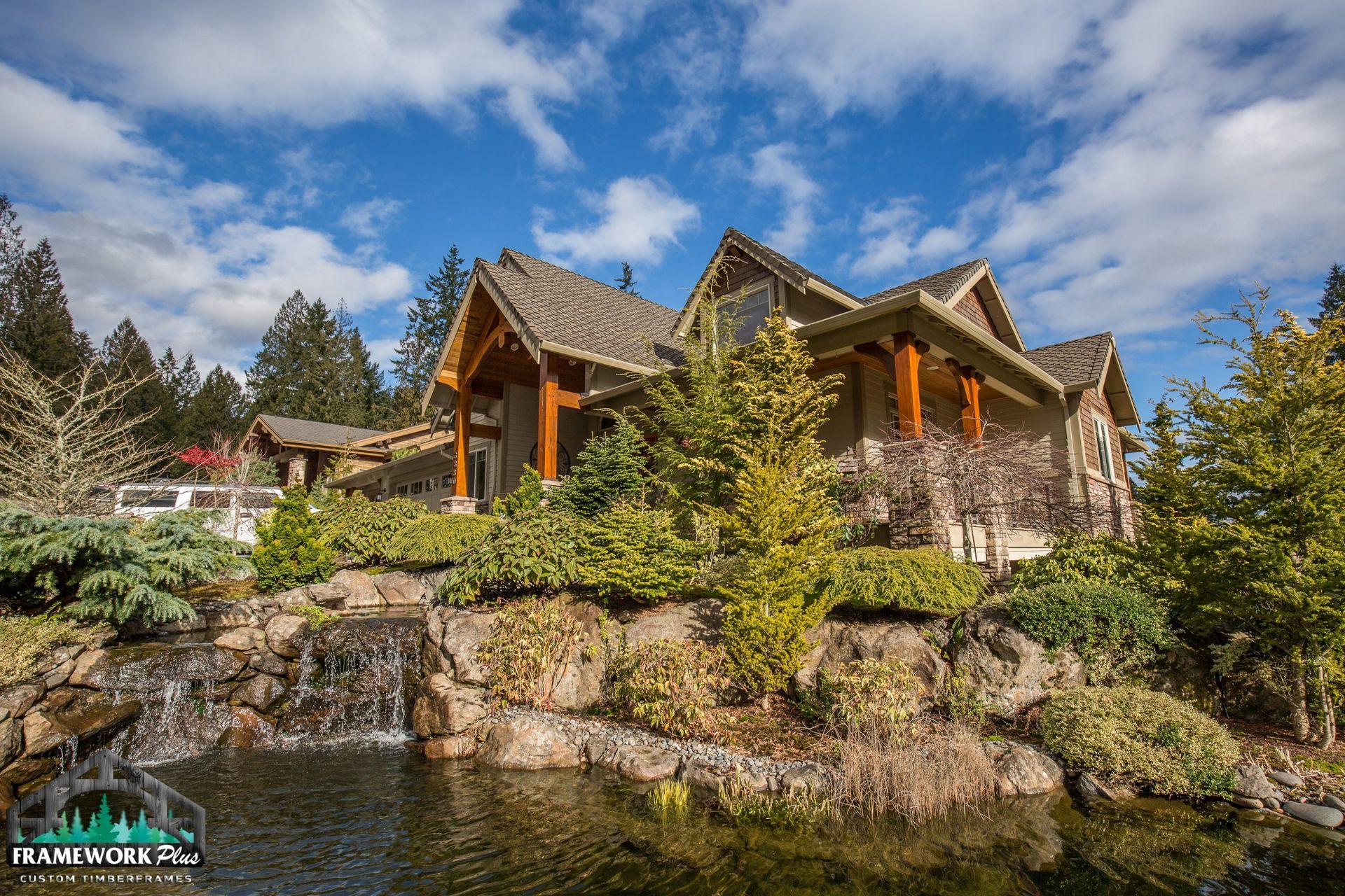 A large house with a waterfall in front of it