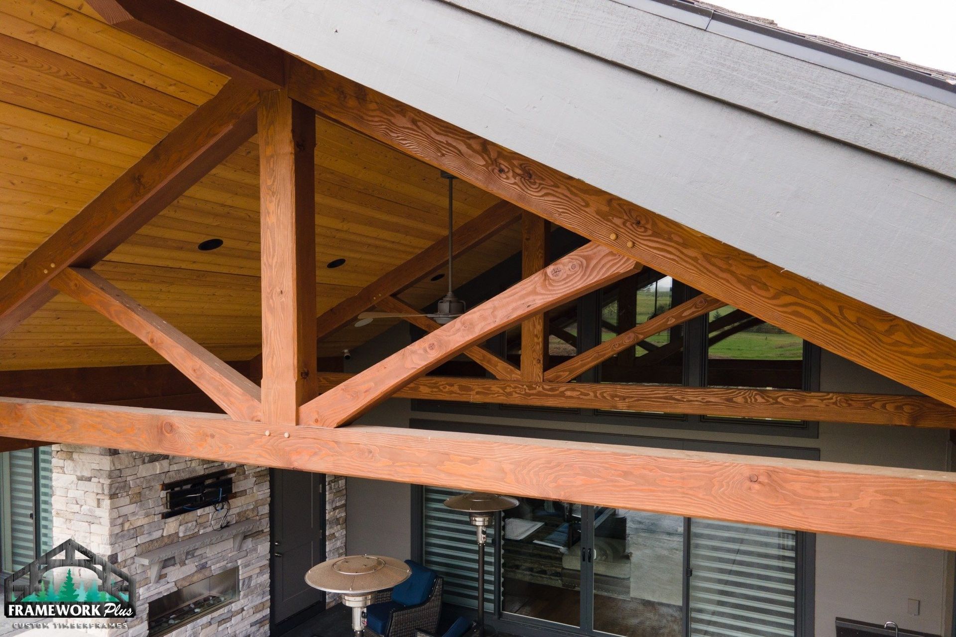 A roof with a lot of wooden beams on it