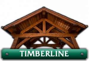 A green sign that says timberline on it