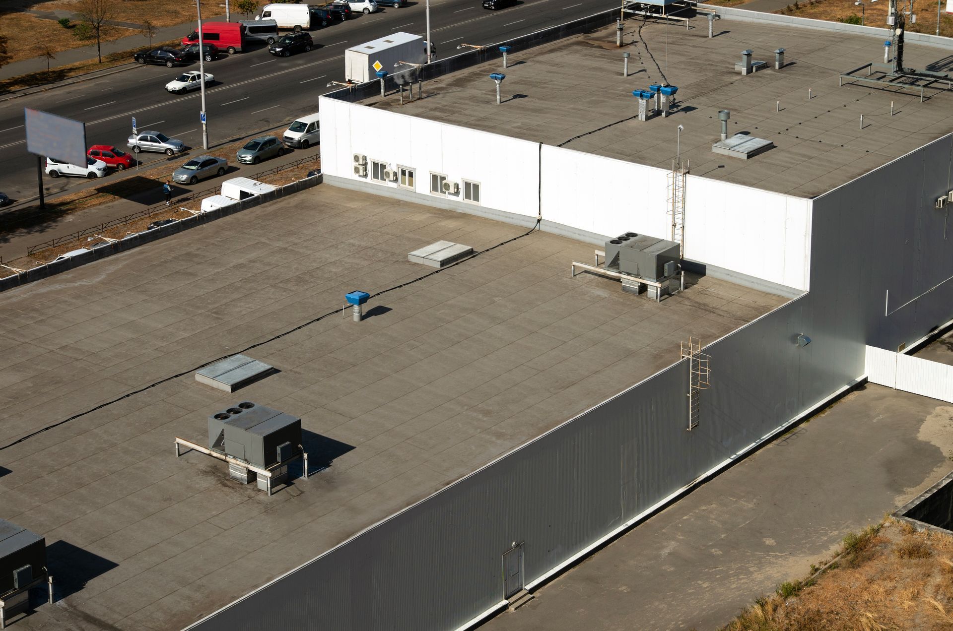 View of the roof of a commercial building. View of the roof of a commercial building.