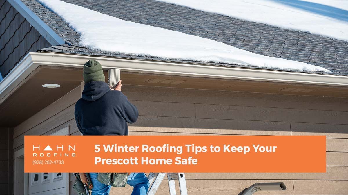 A roofer on a ladder inspecting a snow-covered roof. Text: 