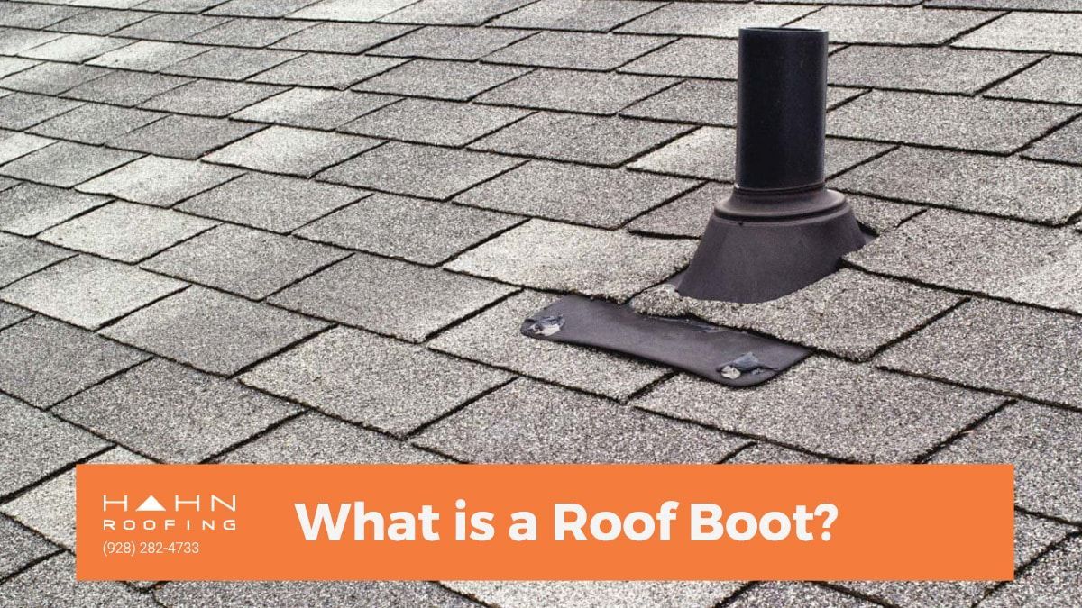 Roof boot on a gray shingle roof; the boot seals around a vent pipe.