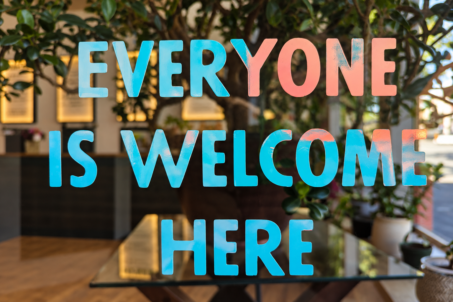 Everyone is welcome here lettering inside Cumberland Cannabis Company